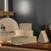 Segments of truffled baron and two glasses of champagne